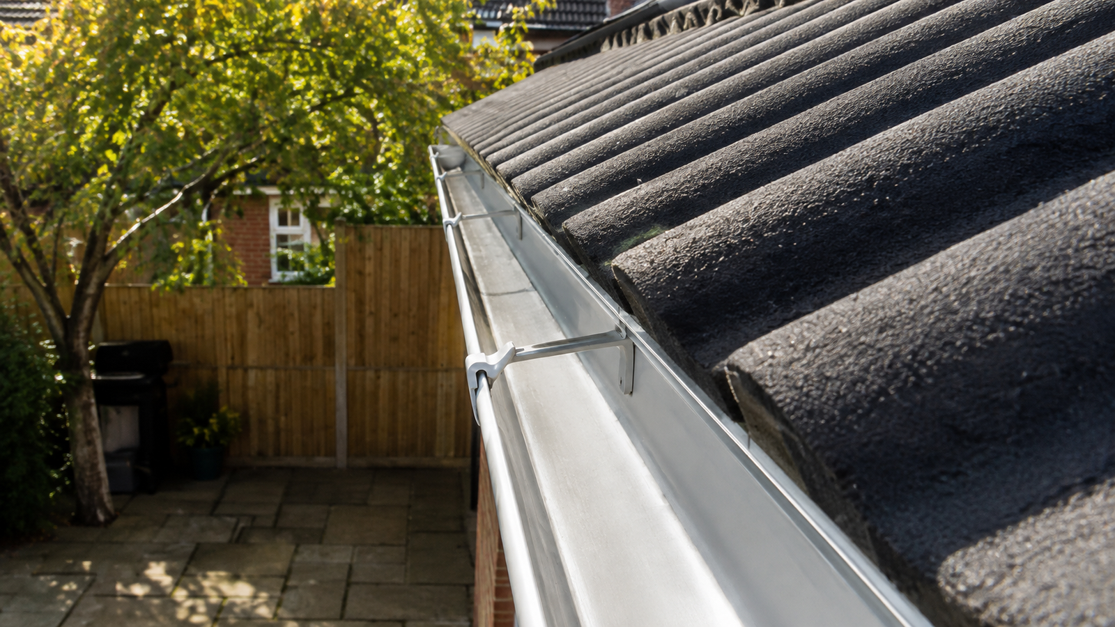 Birmingham gutter after summer health check showing clear channels and proper water flow