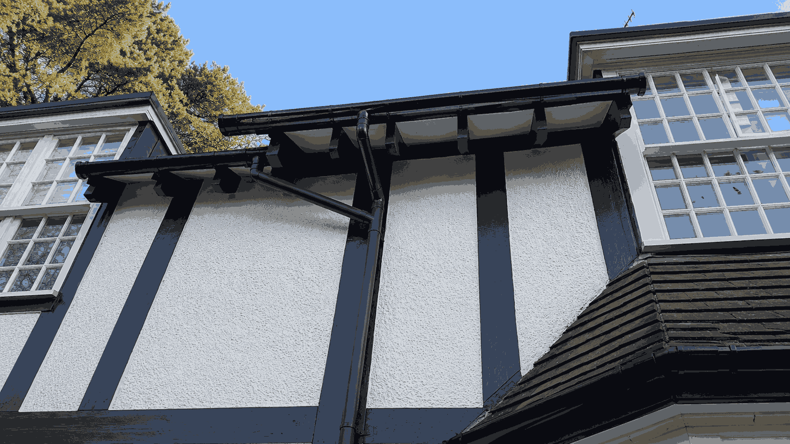Gutter overflow saturating Birmingham brickwork mechanism 1 water damage