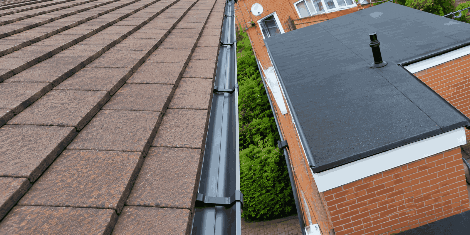 Clean, fully operational gutter system after post-storm emergency clearing