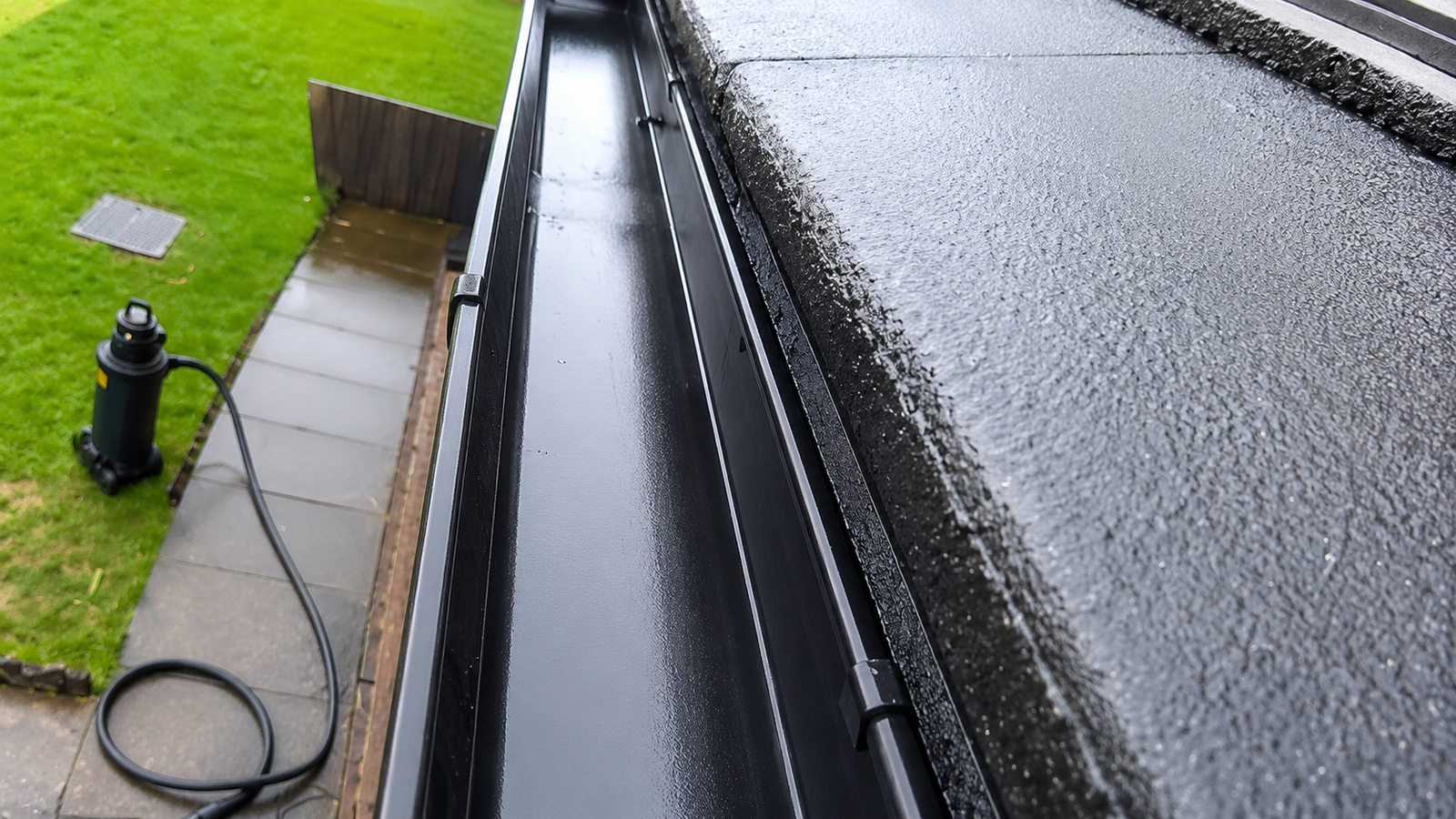 Same Birmingham gutter channel fully cleared to the uPVC floor after professional ground-based vacuum cleaning by WOW Gutters Ltd – unobstructed rainwater drainage restored