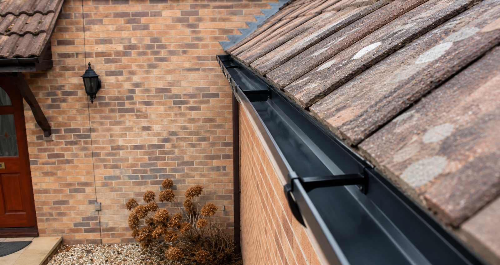 Commercial gutter and roof cleaning — industrial