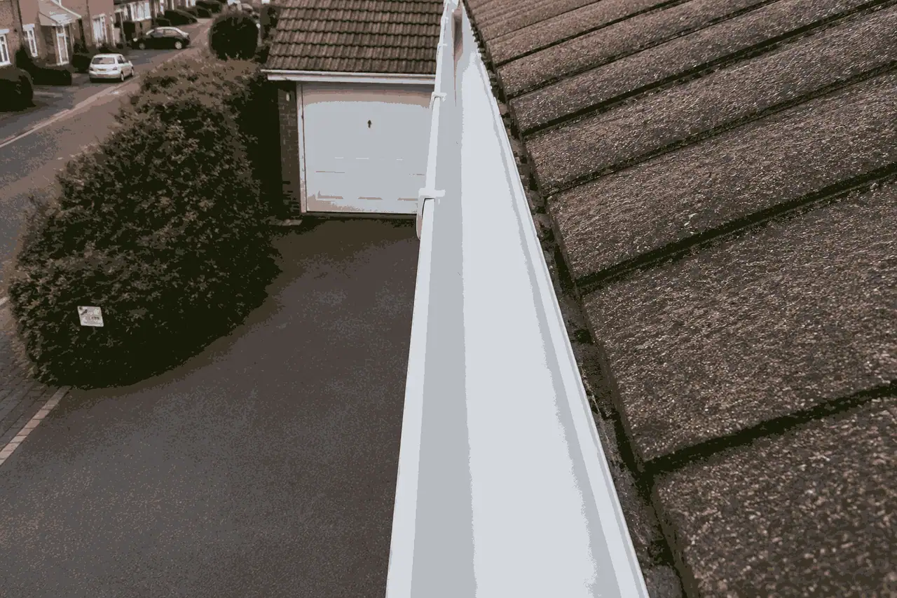 Birmingham gutter after summer inspection showing fully cleared channel with silt layer removed